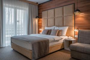 Postel nebo postele na pokoji v ubytování Hotel Mirjana & Rastoke