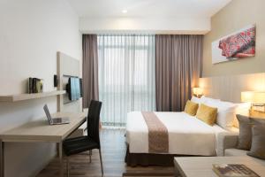 Letto o letti in una camera di Citadines Uplands Kuching