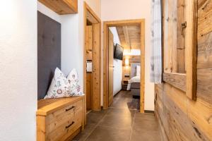 Łóżko lub łóżka w pokoju w obiekcie Chalet Waschkuchl