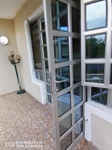a door with glass panels on a house at Lytton Cresent B&B in Pinetown