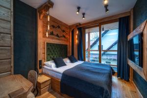 Posteľ alebo postele v izbe v ubytovaní Mountain Shelter Apartments
