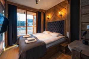 Posteľ alebo postele v izbe v ubytovaní Mountain Shelter Apartments
