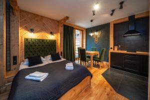 Posteľ alebo postele v izbe v ubytovaní Mountain Shelter Apartments + 14 fotografií