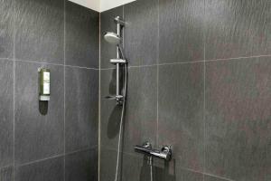 Koupelna v ubytování Luxx City Apartments