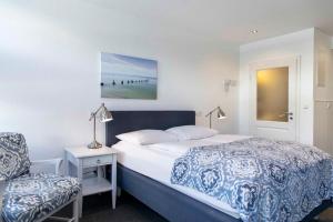 Postel nebo postele na pokoji v ubytování Luxx City Apartments