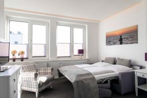 Postel nebo postele na pokoji v ubytování Luxx City Apartments