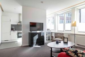 Kuchyň nebo kuchyňský kout v ubytování Luxx City Apartments