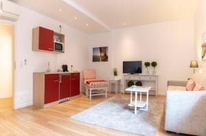 Kuchyň nebo kuchyňský kout v ubytování Luxx City Apartments