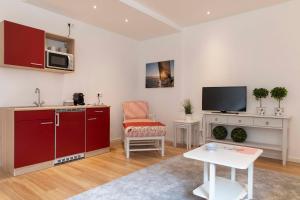 Kuchyň nebo kuchyňský kout v ubytování Luxx City Apartments