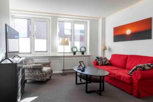 TV a/nebo společenská místnost v ubytování Luxx City Apartments