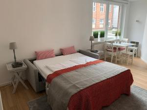 Postel nebo postele na pokoji v ubytování Luxx City Apartments