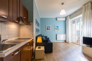 Телевизор и/или развлекательный центр в Residence Sole Mare Alaxi Hotels