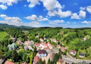 an aerial view of a small town in the mountains at Depandance Haná in Lázně Libverda