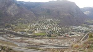 an aerial view of a town in the mountains at Appartement neuf dans maison in Villargondran