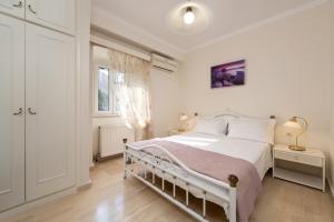 A bed or beds in a room at The Old Mansion