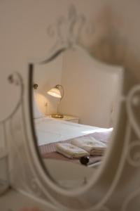 A bed or beds in a room at The Old Mansion