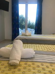 Postel nebo postele na pokoji v ubytování Room in Studio - Studio Banos Apartments and Swimming Pool