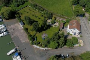 an overhead view of a large house with a yard at Domaine du Port Sainte Marie in Maizi&egrave;res-l&egrave;s-Vic