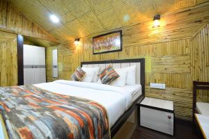 Letto o letti in una camera di Hotel Bamboo Castle