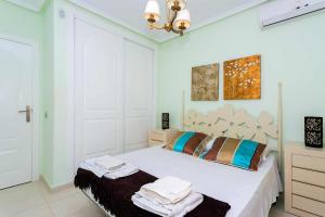 Posteľ alebo postele v izbe v ubytovaní CH Villa Calida Monteazul
