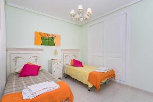 Posteľ alebo postele v izbe v ubytovaní CH Villa Calida Monteazul + 28 fotografií