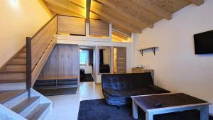 Telewizja i/lub zestaw kina domowego w obiekcie IMBACHHORN Pension in den Alpen