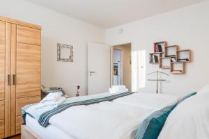 Posteľ alebo postele v izbe v ubytovaní Apartmány Resort Vrchlabí