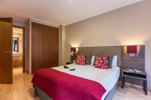Ein Bett oder Betten in einem Zimmer der Unterkunft Pierre & Vacances Andorra El Tarter