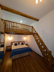 Ein Bett oder Betten in einem Zimmer der Unterkunft Ski Top Busteni