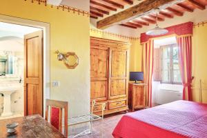 Postel nebo postele na pokoji v ubytování Hotel Borgo Casabianca