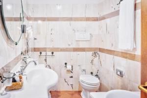 Koupelna v ubytování Hotel Borgo Casabianca