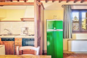 Kuchyň nebo kuchyňský kout v ubytování Hotel Borgo Casabianca
