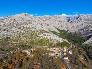 an aerial view of a mountain with a town at Apartmani Villa Paulo in Starigrad