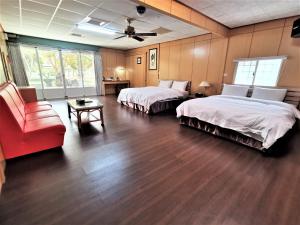 Postel nebo postele na pokoji v ubytování 四重溪可以居民宿 Fine Inn