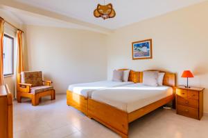 Кровать или кровати в номере Steps Algarve @ Praia da Falésia 300 meters