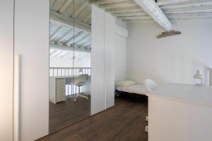Posteľ alebo postele v izbe v ubytovaní Indipendenza House by Mmega