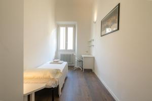 Posteľ alebo postele v izbe v ubytovaní Indipendenza House by Mmega
