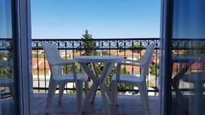 Ein Balkon oder eine Terrasse in der Unterkunft Ruzica Apartments