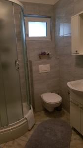 Ein Badezimmer in der Unterkunft Ruzica Apartments