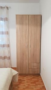 Ein Bett oder Betten in einem Zimmer der Unterkunft Ruzica Apartments