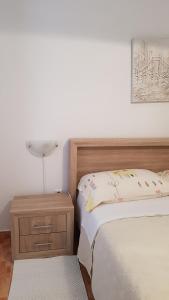Ein Bett oder Betten in einem Zimmer der Unterkunft Ruzica Apartments