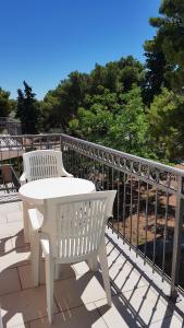 Ein Balkon oder eine Terrasse in der Unterkunft Ruzica Apartments