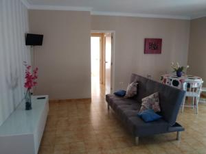 TV a/nebo společenská místnost v ubytování CASA PORTELA APARTAMENTOS