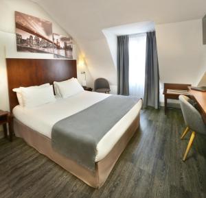 Postel nebo postele na pokoji v ubytování Best Western Lyon Saint-Antoine + 37 fotografií