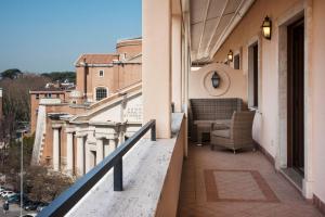
A balcony or terrace at Radisson Blu GHR Rome

