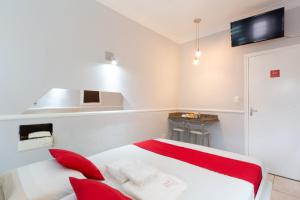 Cama ou camas em um quarto em Hotel Anália Franco