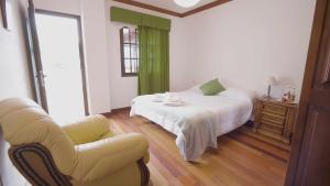 Postel nebo postele na pokoji v ubytování Canary Bio Hostel Tenerife