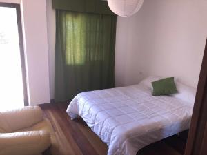 Postel nebo postele na pokoji v ubytování Canary Bio Hostel Tenerife