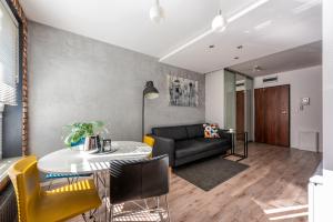 Istumisnurk majutusasutuses apartamenty-wroc Golden House