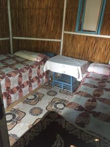 Postel nebo postele na pokoji v ubytování Al Salam Camp